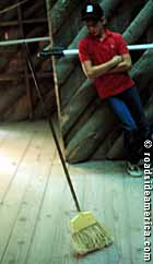 Broom stands at Blowing Rock Mystery Spot.